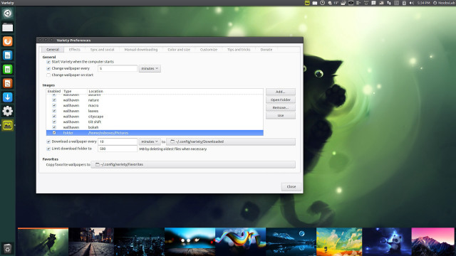 Cat on computer screen with free wallpaper for desktop - medium preview image