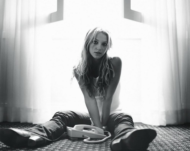 Woman sitting floor remote control #2 free wallpaper for desktop - medium preview image