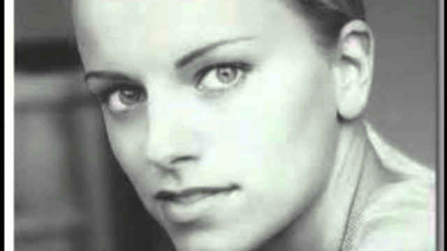 Woman shaved head tie serious free wallpaper for desktop - medium preview image