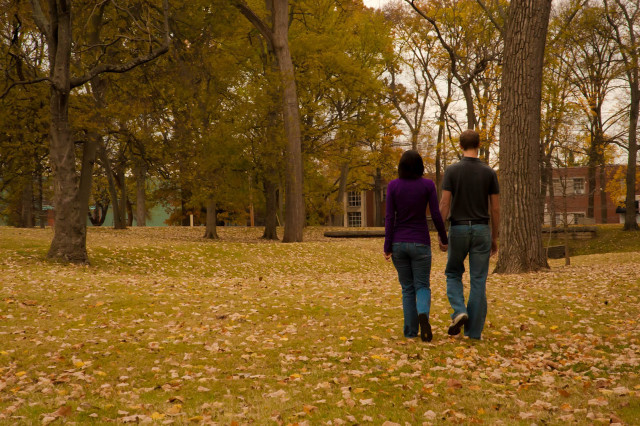 Man woman walking autumn park free wallpaper for desktop - medium preview image