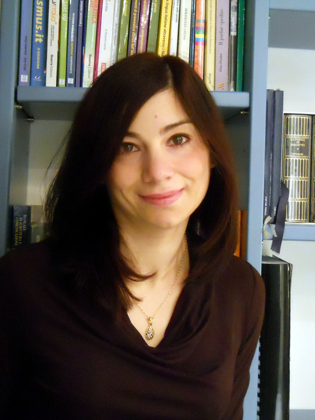 Woman standing bookshelf tv background free wallpaper for mobile - medium preview image