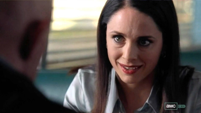 Creepy woman talking man suit free wallpaper for desktop - medium preview image