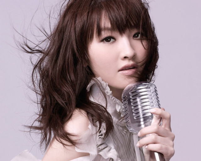 Woman microphone posing picture hair free wallpaper for desktop - medium preview image