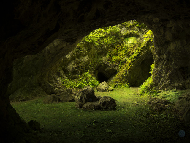 Cave small entrance green lawn free wallpaper for desktop - medium preview image