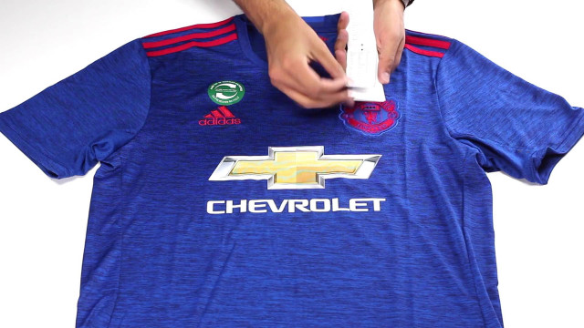 Person holding wii controller blue free wallpaper for desktop - medium preview image