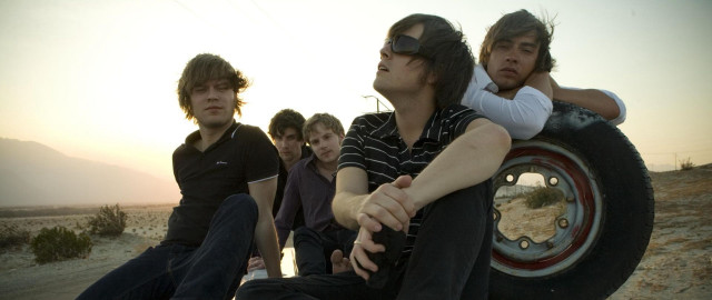 Young men desert tire sunset free wallpaper for desktop - medium preview image