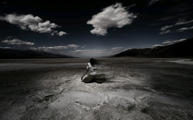 Woman sitting rock desert mountains free wallpaper for desktop - medium preview image