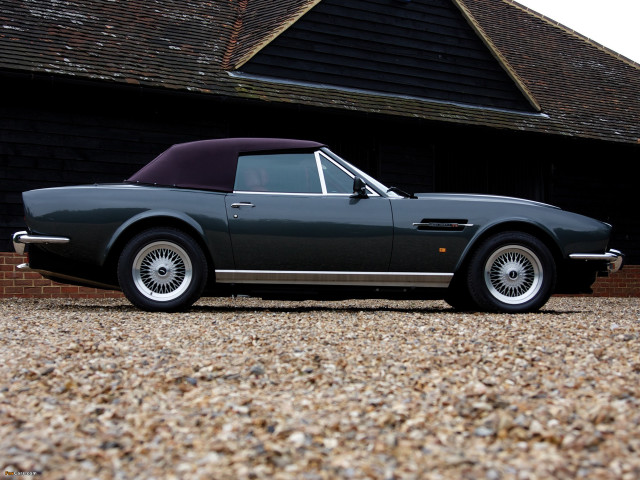 Grey sports car parked building free wallpaper for desktop - medium preview image