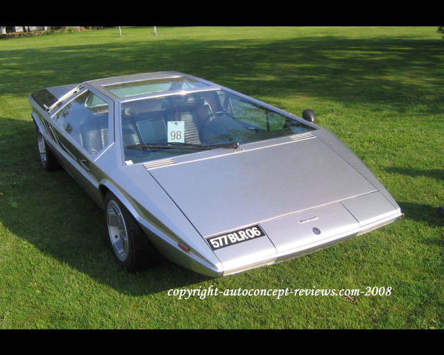 Silver car parked lush green free wallpaper for desktop - medium preview image