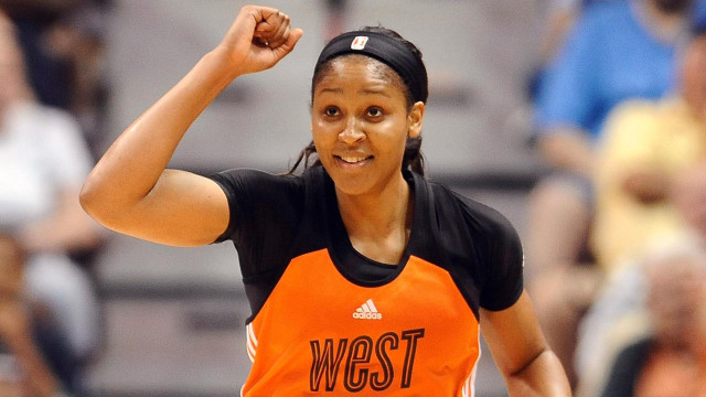 Woman celebrating basketball game crowd free wallpaper for desktop - medium preview image