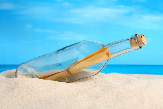 Message in a bottle beach free wallpaper for desktop - medium preview image