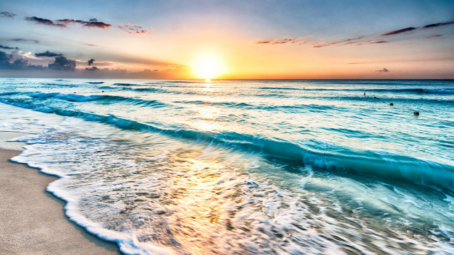 Beach waves sunset people swimming free wallpaper for desktop - medium preview image