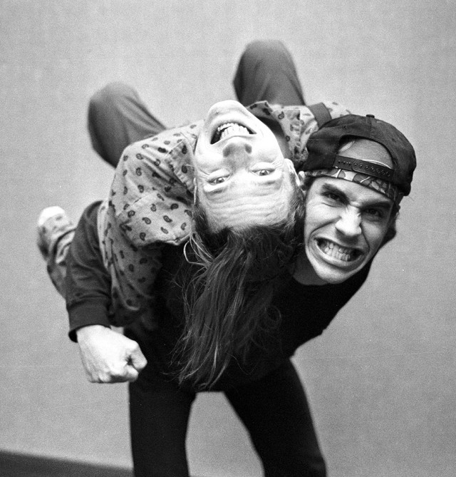 Man holding woman upside down free wallpaper for tablet - medium preview image