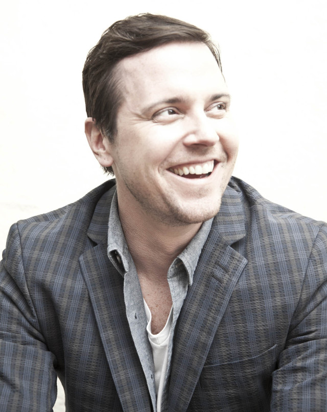 Man suit smiling camera white free wallpaper for mobile - medium preview image