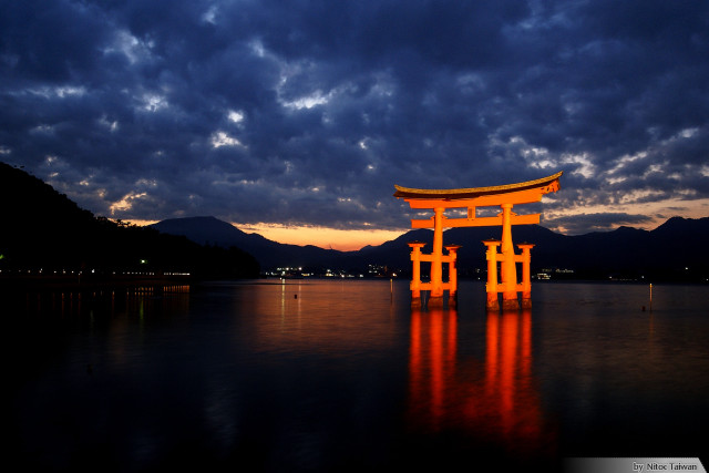 Large orange structure lake cloudy free wallpaper for desktop - medium preview image