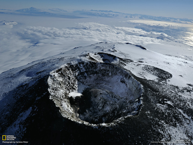 Large crater snowy mountain range free wallpaper for desktop - medium preview image