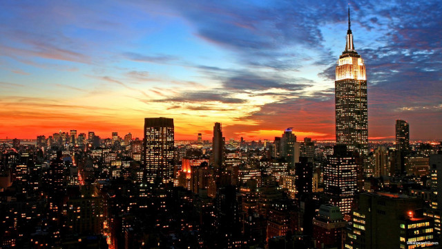 City skyline tall building sunset free wallpaper for desktop - medium preview image