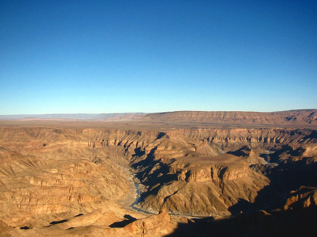 Canyon view plane window mountains free wallpaper for desktop - medium preview image