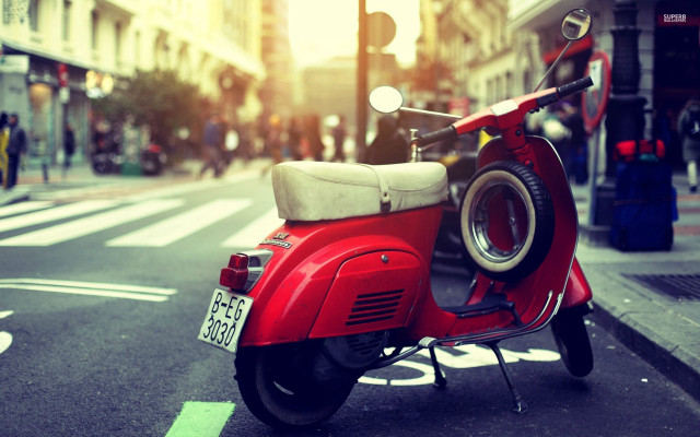 Red scooter parked street traffic free wallpaper for desktop - medium preview image
