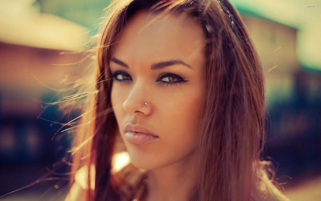 Woman nose piercing train blurry free wallpaper for desktop - medium preview image