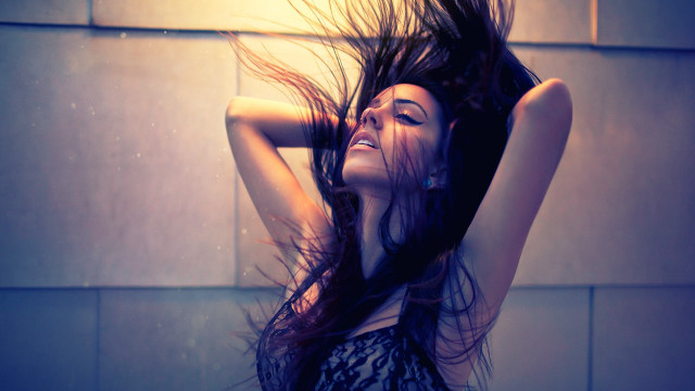 Woman hair blowing wind wall free wallpaper for desktop - medium preview image