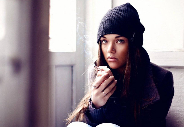 Woman sitting couch cigarette hand free wallpaper for desktop - medium preview image