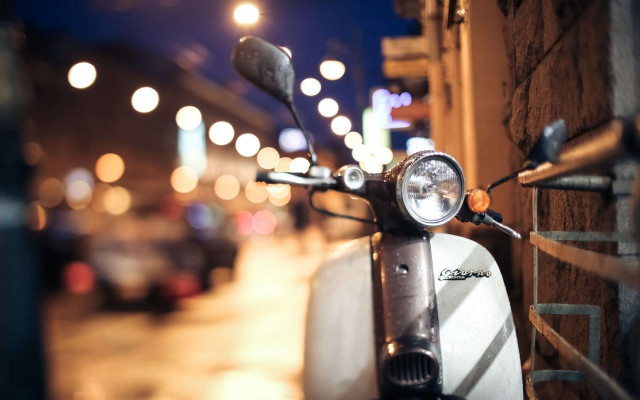 Scooter parked nighttime street lights free wallpaper for desktop - medium preview image