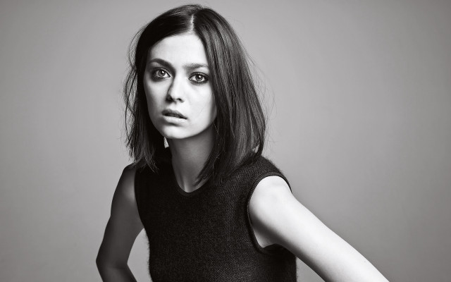 Woman black top posing picture free wallpaper for desktop - medium preview image