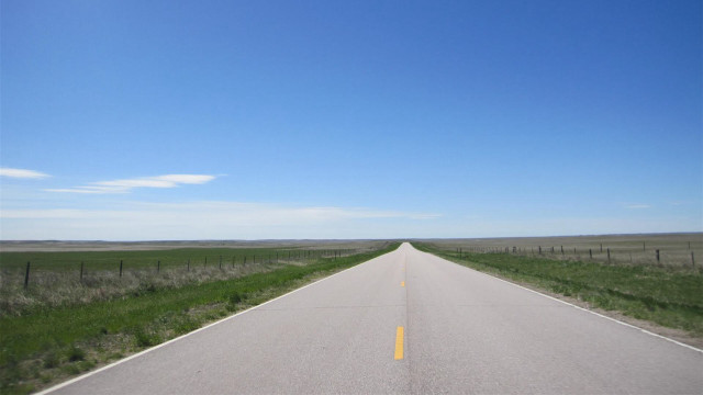 Long straight road fence grass free wallpaper for desktop - medium preview image