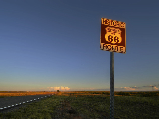 Road sign mountain sky ocean free wallpaper for desktop - medium preview image