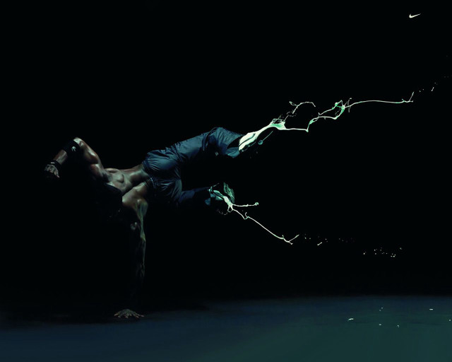 Man handstand dark legs spread free wallpaper for desktop - medium preview image