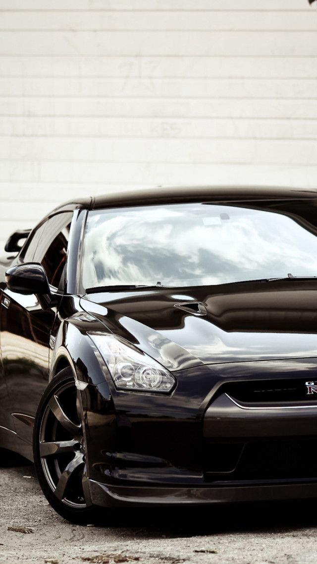 Black car white wall building free wallpaper for mobile - medium preview image