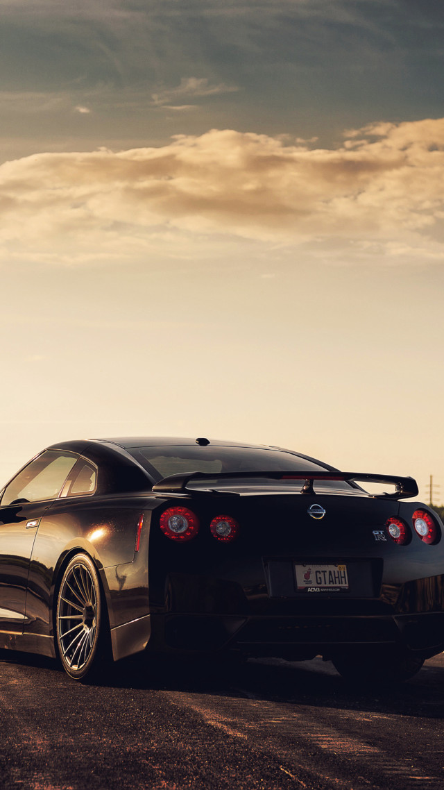 Black sports car sunset dawn free wallpaper for mobile - medium preview image