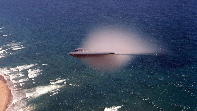 Boat water shore beach sandy free wallpaper for desktop - medium preview image