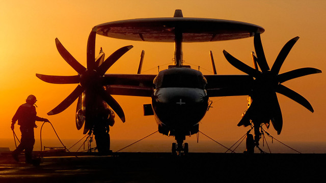 Man propeller plane field sunset free wallpaper for desktop - medium preview image