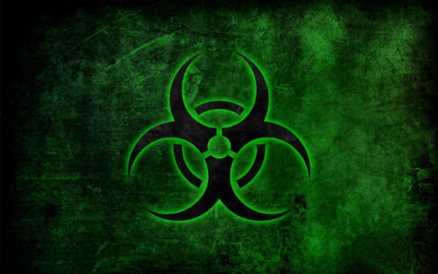 Green biohazard sign dark background free wallpaper for desktop - medium preview image