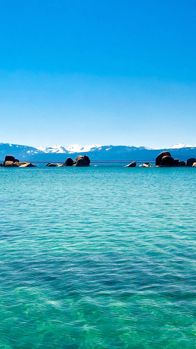 Water rocks mountains distance scenery free wallpaper for mobile - medium preview image