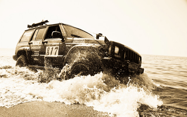 Jeep driving water beach ocean free wallpaper for desktop - medium preview image
