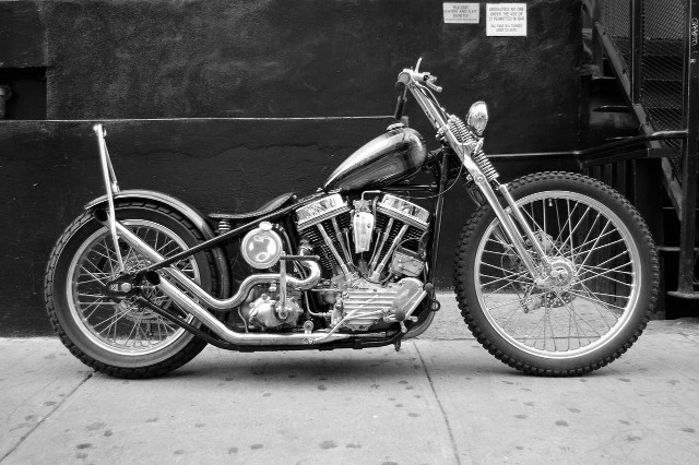 Motorcycle parked street building sign free wallpaper for desktop - medium preview image