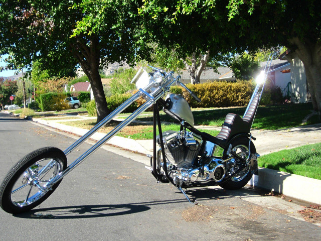 Motorcycle parked road tree sidewalk free wallpaper for desktop - medium preview image