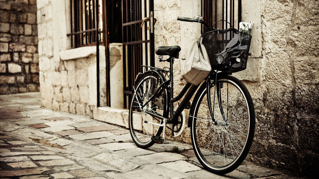 Bicycle building bag shadows sepia free wallpaper for desktop - medium preview image