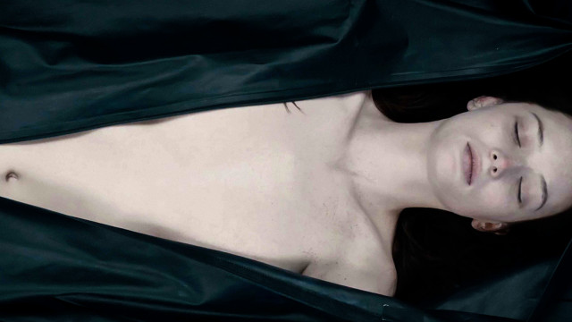 Woman eyes closed laying black free wallpaper for desktop - medium preview image