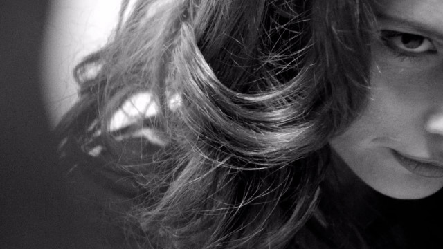 Woman long hair serious look #4 free wallpaper for desktop - medium preview image