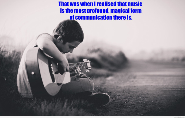 Young boy playing guitar quote free wallpaper for desktop - medium preview image