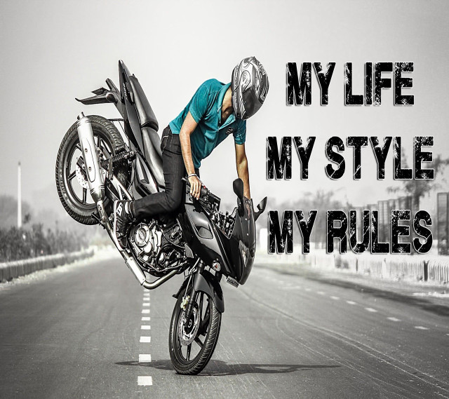 Motorcycle trick man cloudy sky free wallpaper for tablet - medium preview image