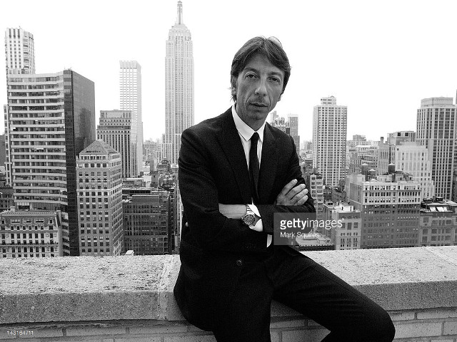 Man suit tie sitting ledge free wallpaper for desktop - medium preview image