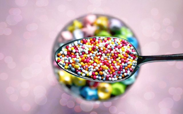 Spoon filled colorful candy sprinkles free wallpaper for desktop - medium preview image