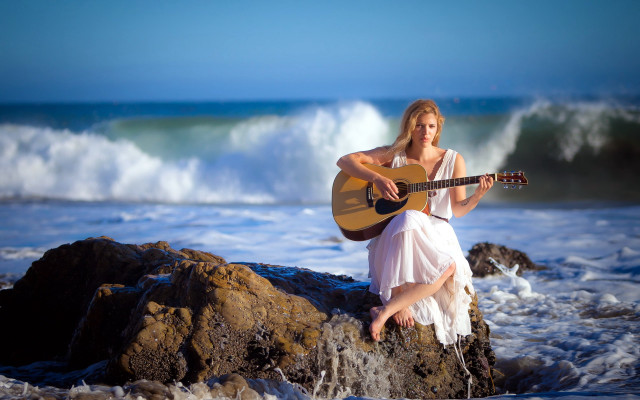 Woman sitting rock playing guitar free wallpaper for desktop - medium preview image