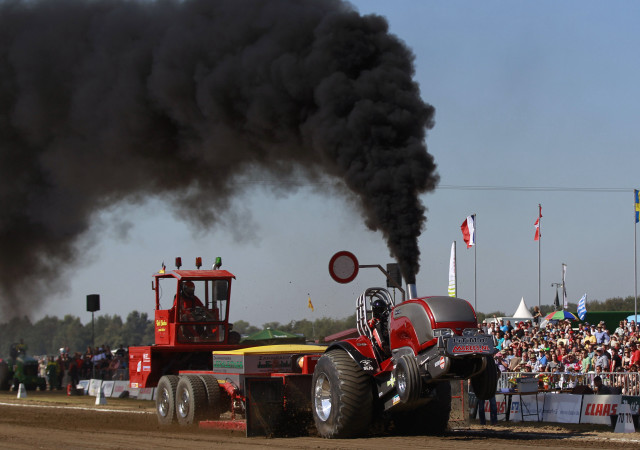 Tractor pulling trailer black smoke free wallpaper for desktop - medium preview image