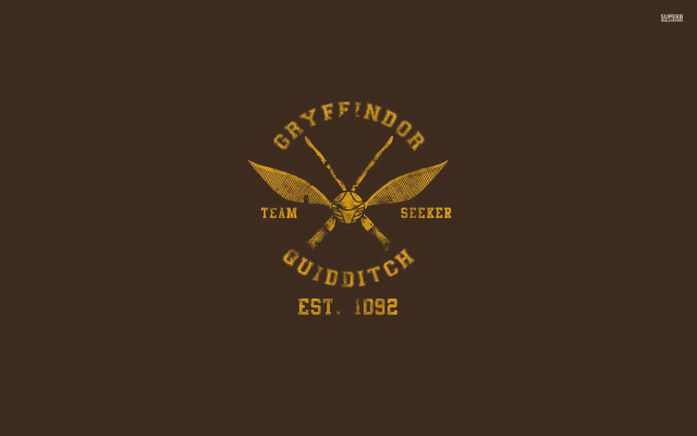 Brown background yellow logo crossed #2 free wallpaper for desktop - medium preview image